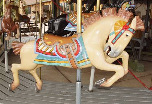 A picture containing floor, carousel, outdoor object, indoor

Description automatically generated