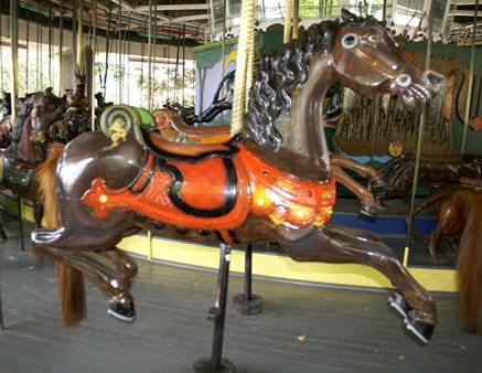 A statue of a carousel

Description generated with high confidence