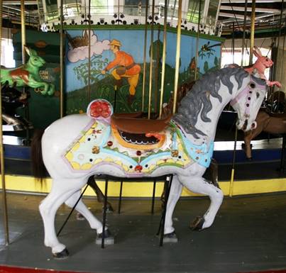 A picture containing floor, indoor, carousel, table

Description generated with very high confidence