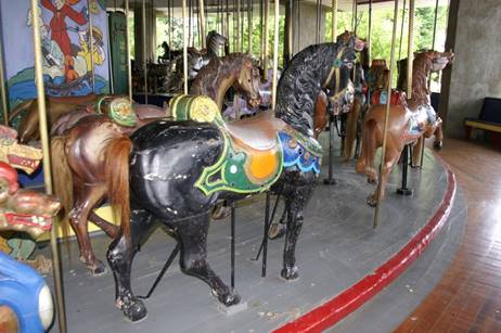 A close up of a carousel

Description generated with high confidence