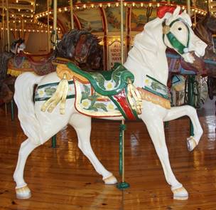 A picture containing carousel, ride, outdoor object, floor

Description generated with very high confidence