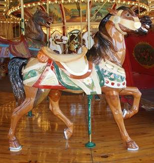A picture containing carousel, indoor, ride, table

Description generated with very high confidence