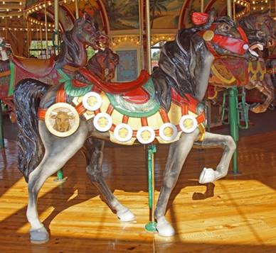 A close up of a carousel

Description generated with high confidence