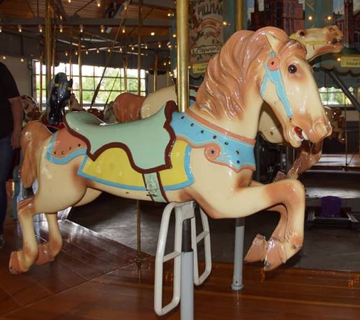 A statue of a carousel

Description automatically generated