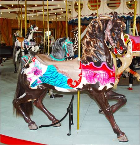 A carousel horse with colorful horses

Description automatically generated with medium confidence