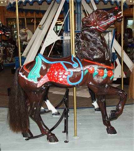 A horse on a carousel

Description automatically generated