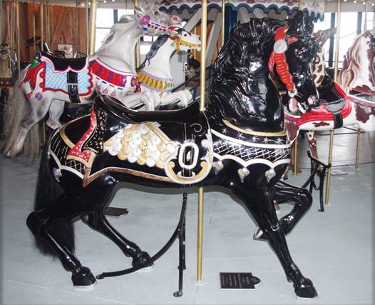 A black and white carousel horse

Description automatically generated