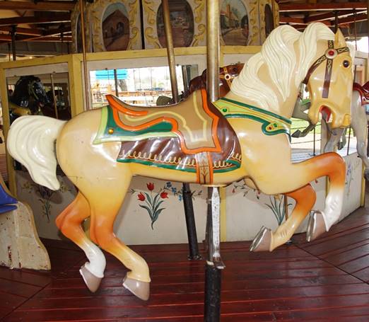 A picture containing indoor, floor, carousel, table

Description automatically generated
