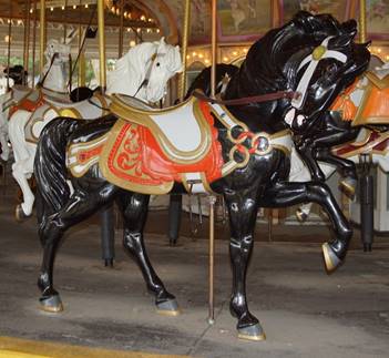 A picture containing carousel, outdoor object, floor, ride

Description generated with very high confidence