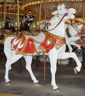 A close up of a carousel

Description generated with very high confidence