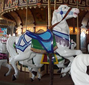 A statue of a carousel

Description generated with high confidence