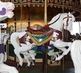 A picture containing carousel, ride, indoor, outdoor object

Description generated with very high confidence