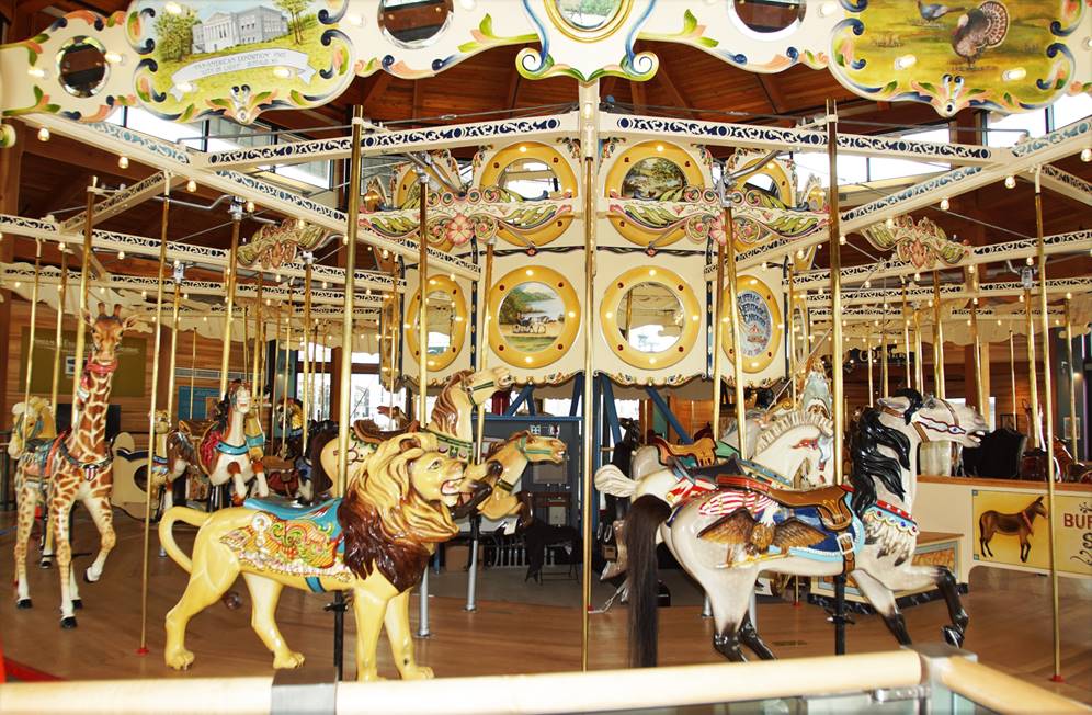 A picture containing carousel, outdoor object, ride, indoor

Description automatically generated