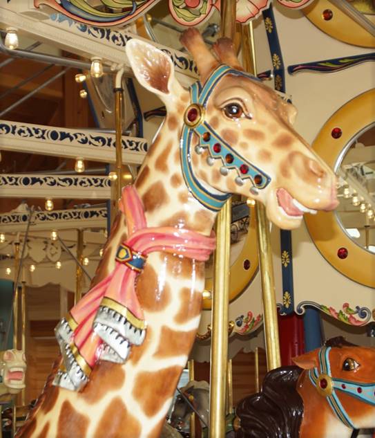 A picture containing indoor, carousel, ride

Description automatically generated