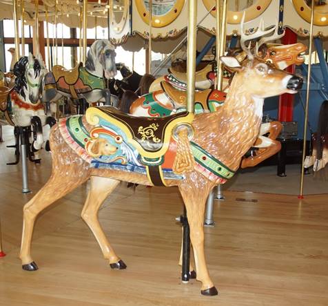 A picture containing floor, indoor, wooden, carousel

Description automatically generated