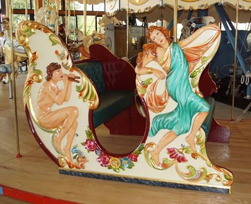 A picture containing carousel, indoor, outdoor object, ride

Description automatically generated
