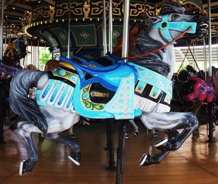 A picture containing floor, indoor, colorful, carousel

Description automatically generated