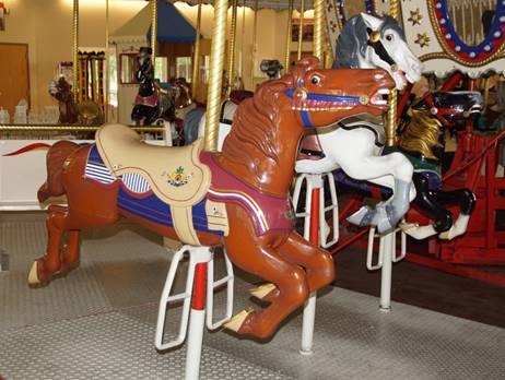 A close-up of a merry-go-round

Description automatically generated