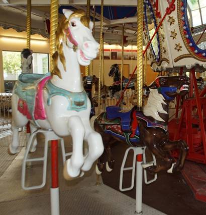 A close-up of a merry-go-round

Description automatically generated