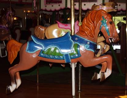 A picture containing floor, outdoor object, indoor, carousel

Description generated with very high confidence