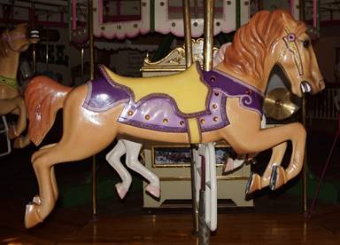 A picture containing floor, carousel, outdoor object, indoor

Description generated with very high confidence