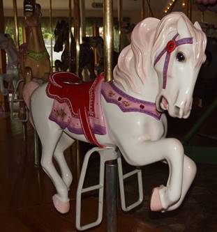 A picture containing carousel, outdoor object, ride, indoor

Description generated with very high confidence