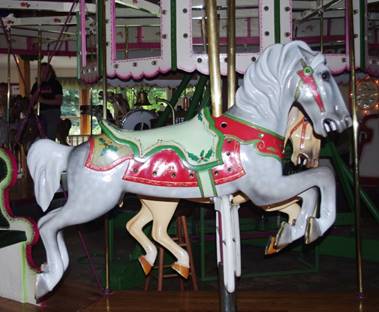 A picture containing floor, carousel, indoor, table

Description generated with very high confidence