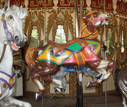 A cow in a carousel

Description automatically generated