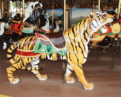 A tiger on a carousel

Description automatically generated