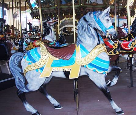 A close-up of a carousel

Description automatically generated