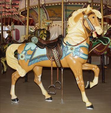 A picture containing floor, carousel, ride, object

Description automatically generated