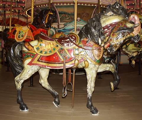 A close up of a carousel

Description automatically generated