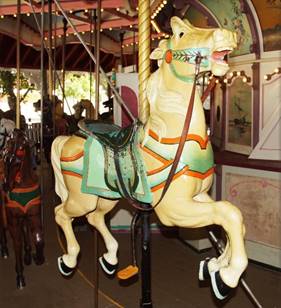 A picture containing carousel, object, ride, indoor

Description automatically generated