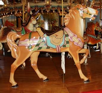 A picture containing floor, indoor, carousel, table

Description automatically generated