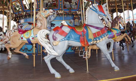 A picture containing carousel, outdoor object, ride, floor

Description generated with very high confidence