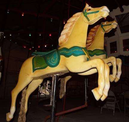 A close up of a carousel horse

Description generated with high confidence