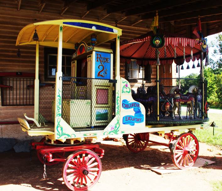 A picture containing outdoor, ground, transport, horse-drawn vehicle

Description automatically generated