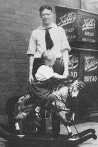 A black and white photo of a person
Description generated with very high confidence