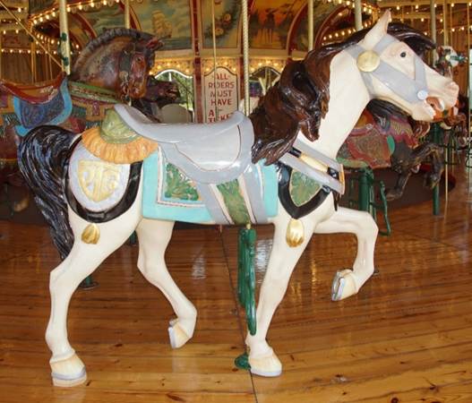 A close up of a carousel

Description generated with high confidence