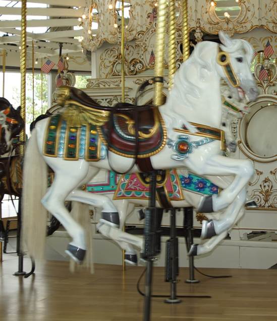 A close up of a carousel
Description automatically generated